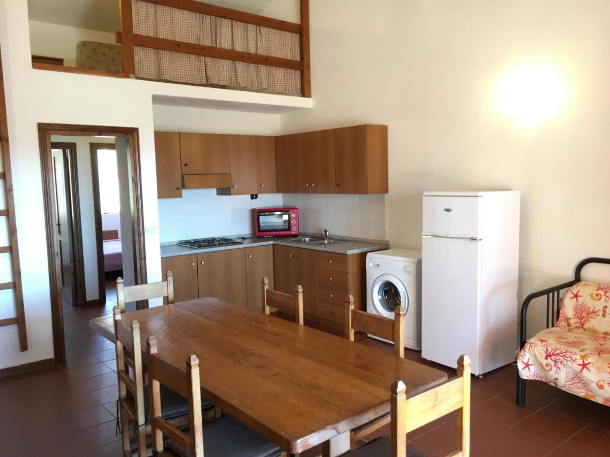 Borgo Spiaggia Isola Rossa Eksteriør billede